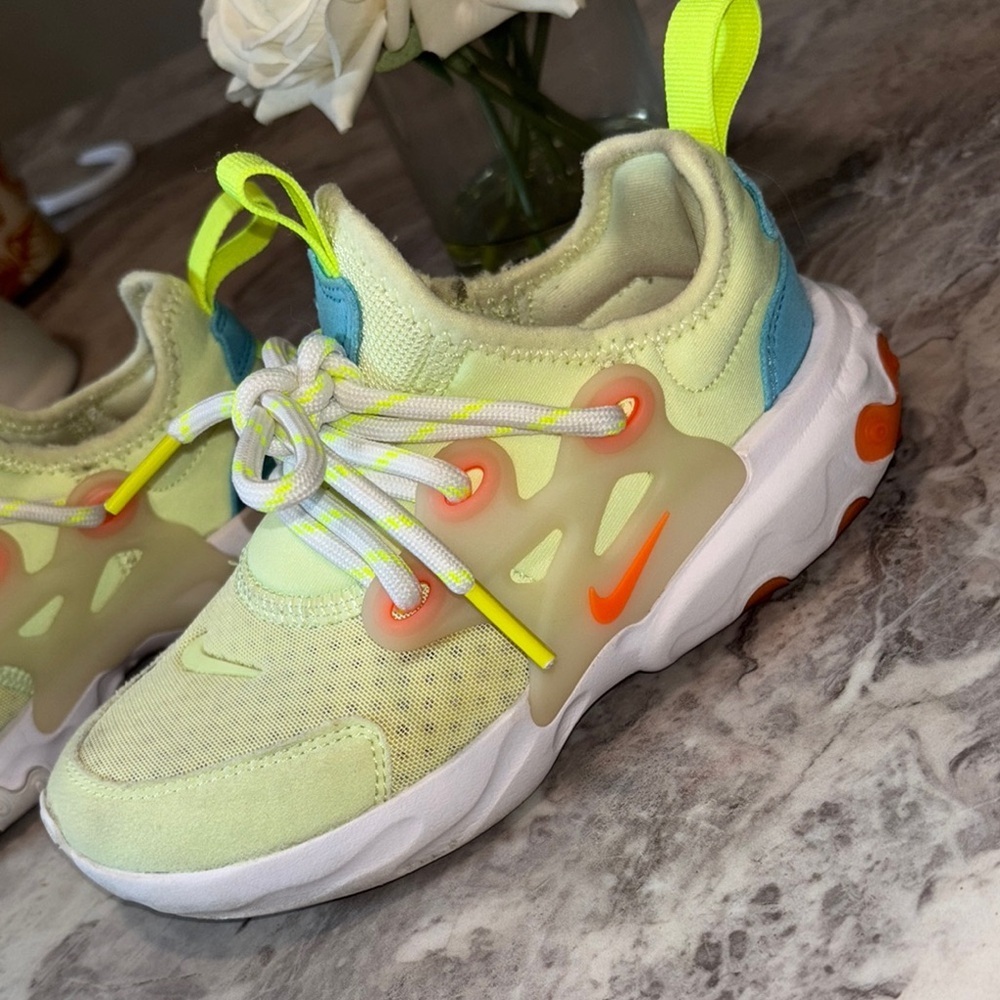 Nike Yellow and Blue React Sneakers Dynamic Design